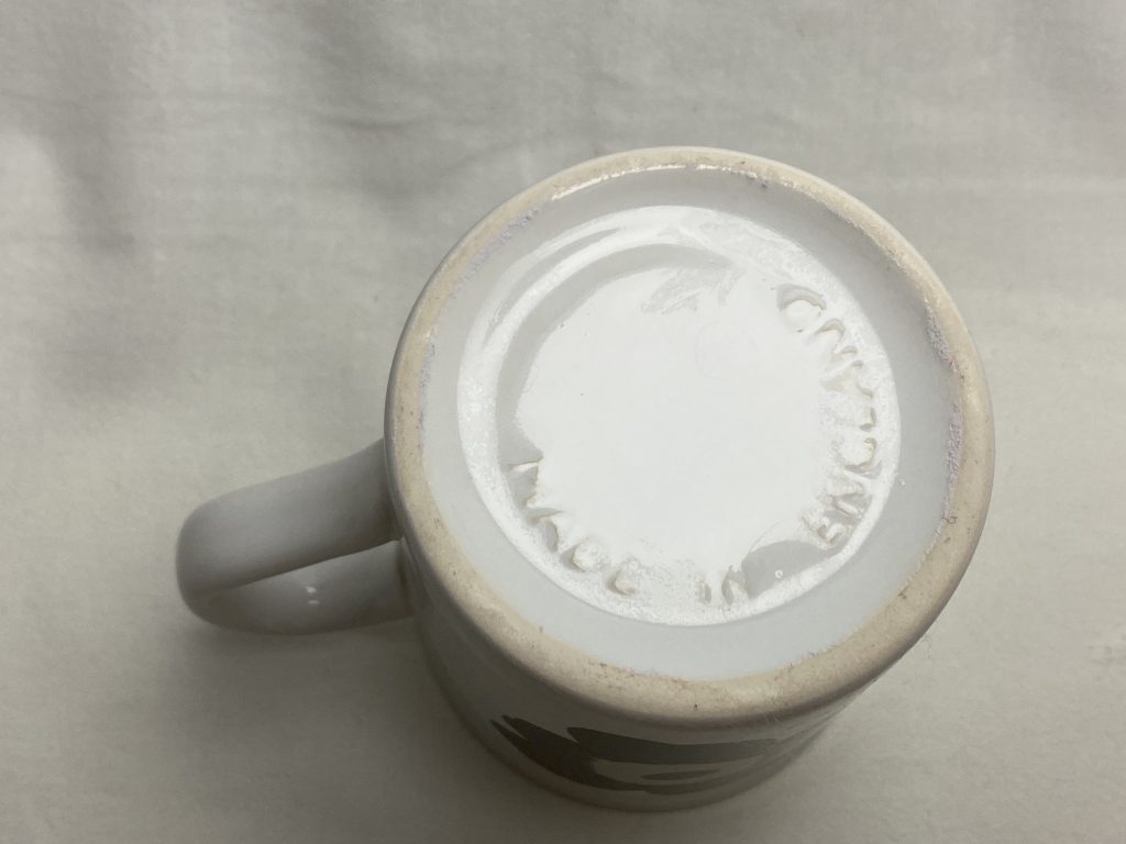 Unikko muki musta Retronomi verkkokauppa